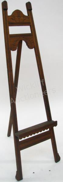 Appraisal: A late Victorian Eastlake style easel with spoon carvings circa