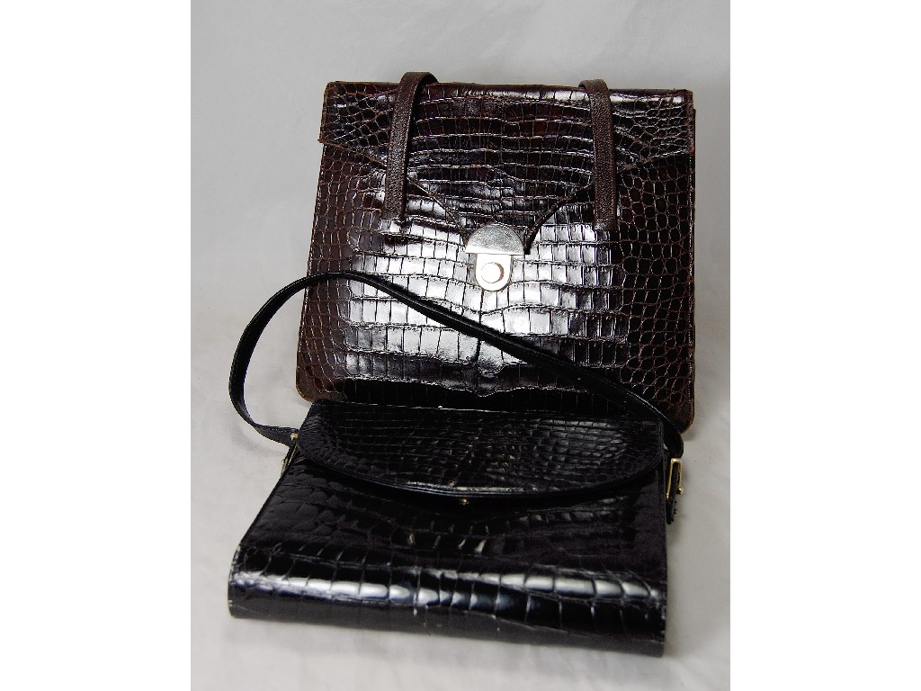 Appraisal: A small black crocodile handbag by Bidente to w a