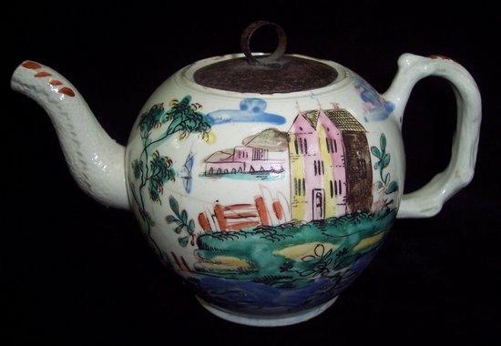 Appraisal: Additional LotA saltglazed teapot with crabs handle painted with buildings