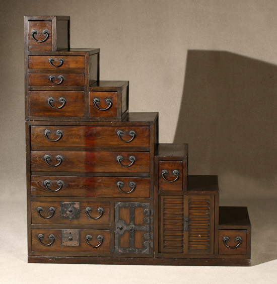 Appraisal: Japanese Black Painted Wrought-Iron Mounted Dark Stained Kiriwood Staircase Chest