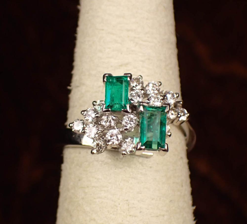 Appraisal: DIAMOND EMERALD AND EIGHTEEN KARAT GOLD RING The white gold