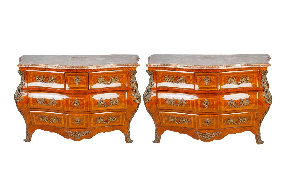 Appraisal: PAIR OF CONTINETAL BOMBE COMMODESwith rouge marble tops parquetry inlay