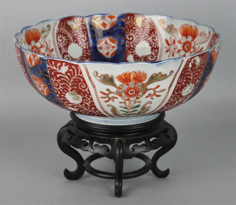 Appraisal: JAPANESE IMARI SCALLOPED BOWL with central floral arrangement in roundel