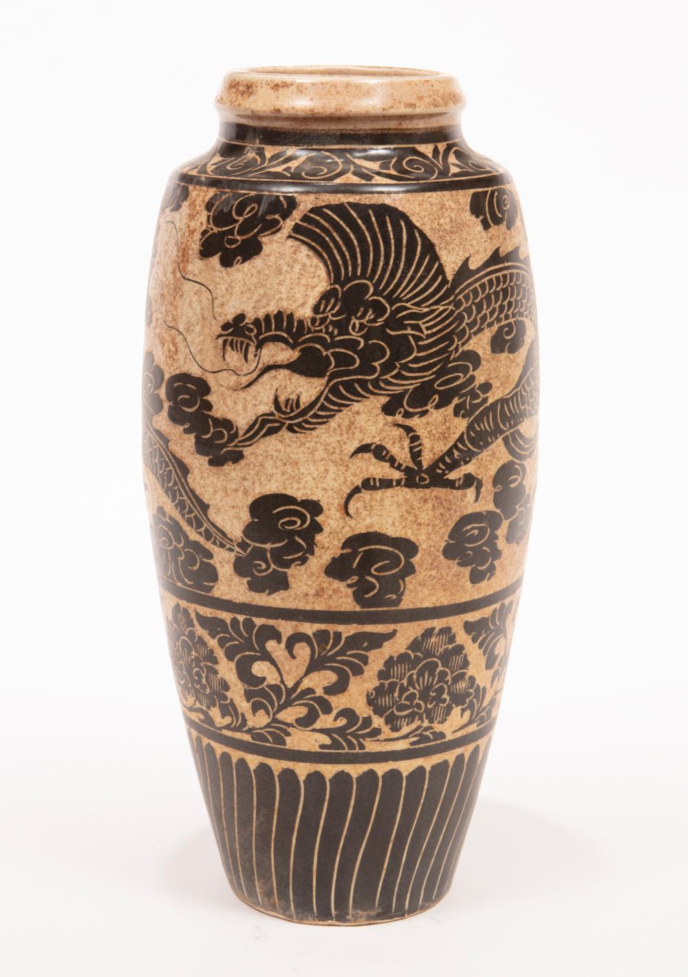 Appraisal: Chinese Cizhou-Style Pottery Vase decorated with a dragon amid clouds