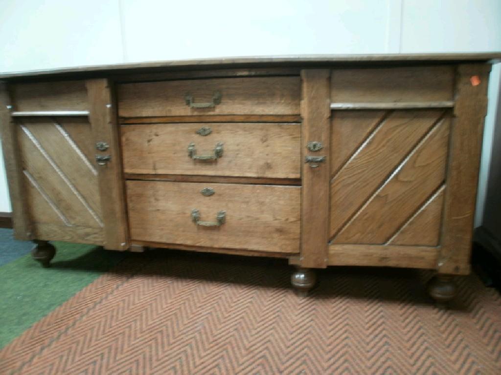 Appraisal: A late Victorian aesthetic movement oak dresser base comprising two