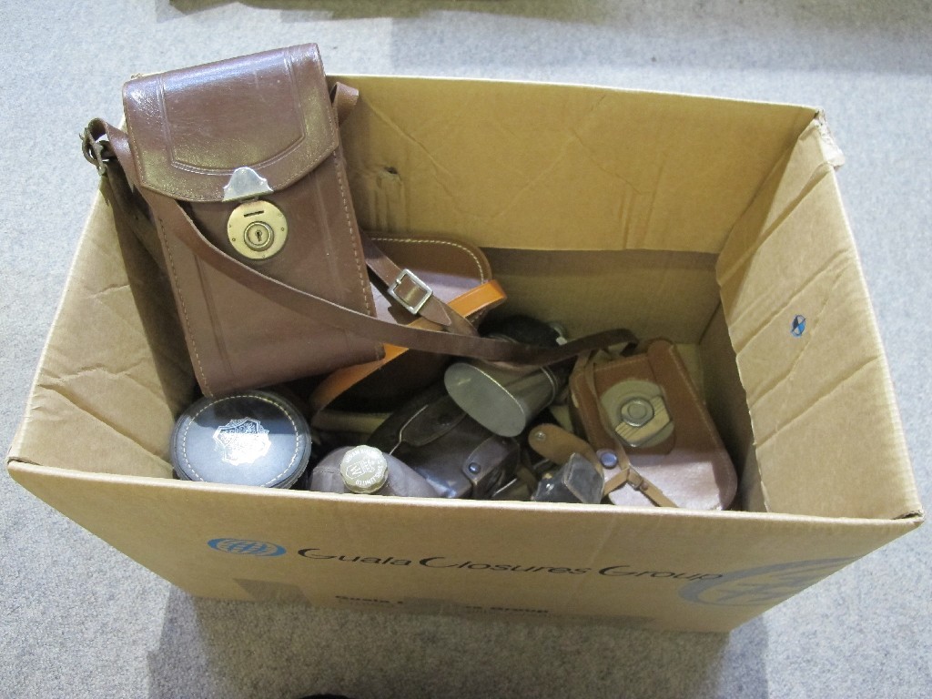 Appraisal: Box of cameras binoculars and spirit flasks