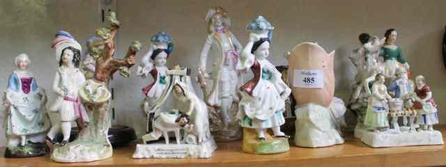 Appraisal: A COLLECTION OF MISCELLANEOUS CERAMIC FIGURES including three Staffordshire examples