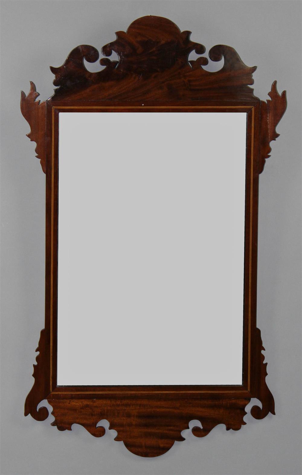 Appraisal: CHIPPENDALE STYLE INLAID MAHOGANY MIRROR having a scroll cut pediment