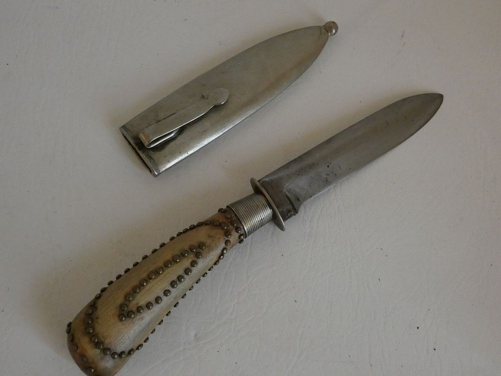 Appraisal: BOWIE KNIFE Antique stag-handled bowie knife with silver plated scabbard