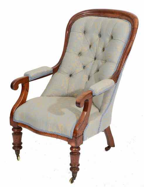 Appraisal: A VICTORIAN MAHOGANY ARMCHAIR with open scroll arms serpentine front