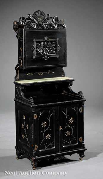 Appraisal: A Diminutive American Aesthetic Ebonized Gilt-Incised and Carved Music Cabinet