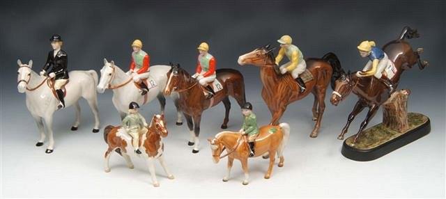 Appraisal: A BESWICK MODEL of a huntswoman on a grey horse