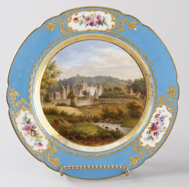 Appraisal: Porcelain plate features Chateau de Courtanvaux at center of plate