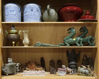 Appraisal: Three Shelves of Asian Items lot of approximately Three shelves