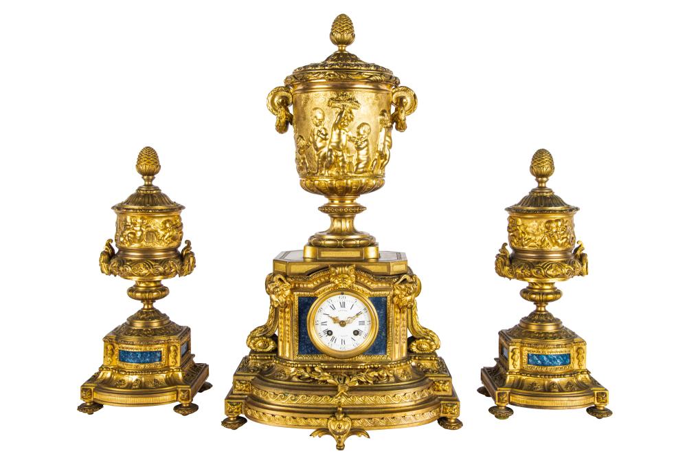 Appraisal: FRENCH STYLE THREE PIECE GILT BRONZE LAPIS CLOCK GARNITUREthe face