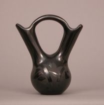 Appraisal: Mexican Vase with Handle Double opening vase Bulb base branches