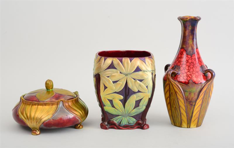 Appraisal: THREE VILMOS ZSOLNAY POTTERY ARTICLES Comprising a decanter with raised