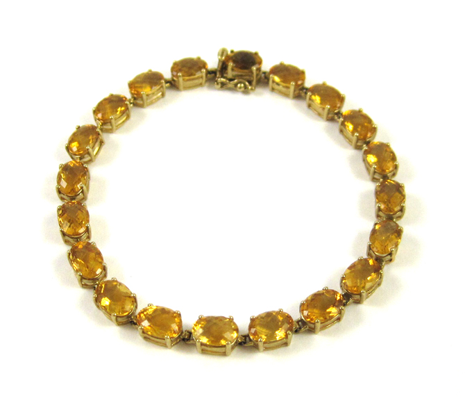 Appraisal: CITRINE AND TEN KARAT GOLD BRACELET measuring - inches in