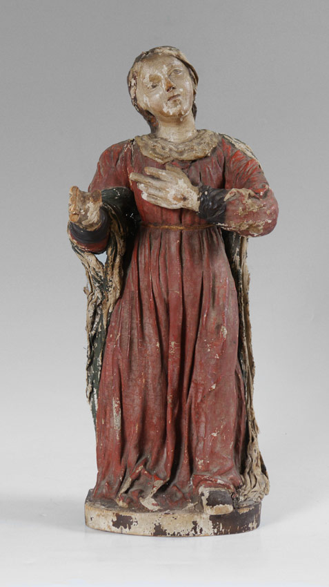 Appraisal: CARVED POLYCHROME SANTOS STATUTE Carved wood with applied paper mache