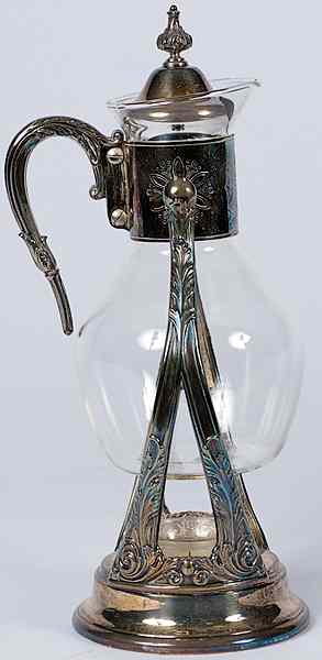 Appraisal: Silver and Glass Jug with Stand American a Corning glass