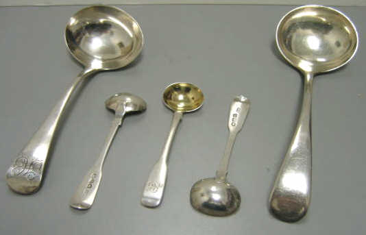 Appraisal: FIVE ENGLISH SILVER SERVING SPOONS Sterling silver sauce ladle by