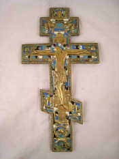 Appraisal: A Russian Orthodox enamelled brass crucifix the reverse engraved overall