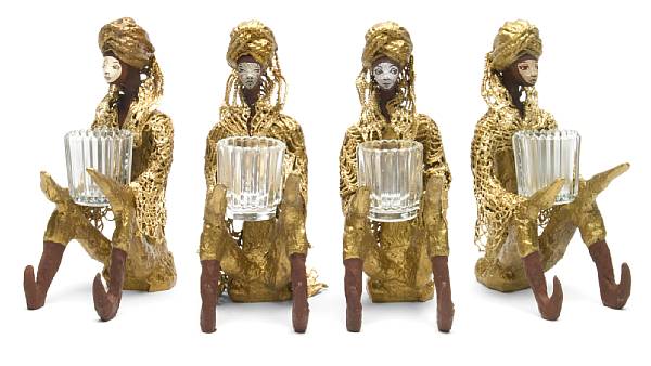 Appraisal: A set of four Tony Duquette mixed media figural votive