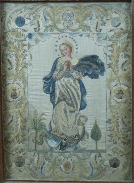 Appraisal: An early th century needlework of the Madonna with coloured