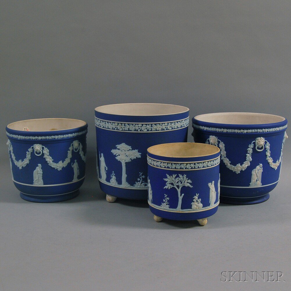 Appraisal: Four Wedgwood Dark Blue Jasper Jardinieres th century of typical