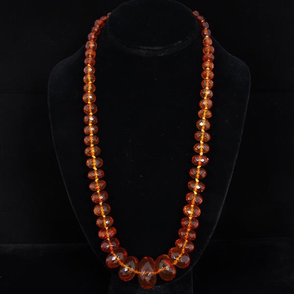 Appraisal: Faceted graduated amber beaded necklace