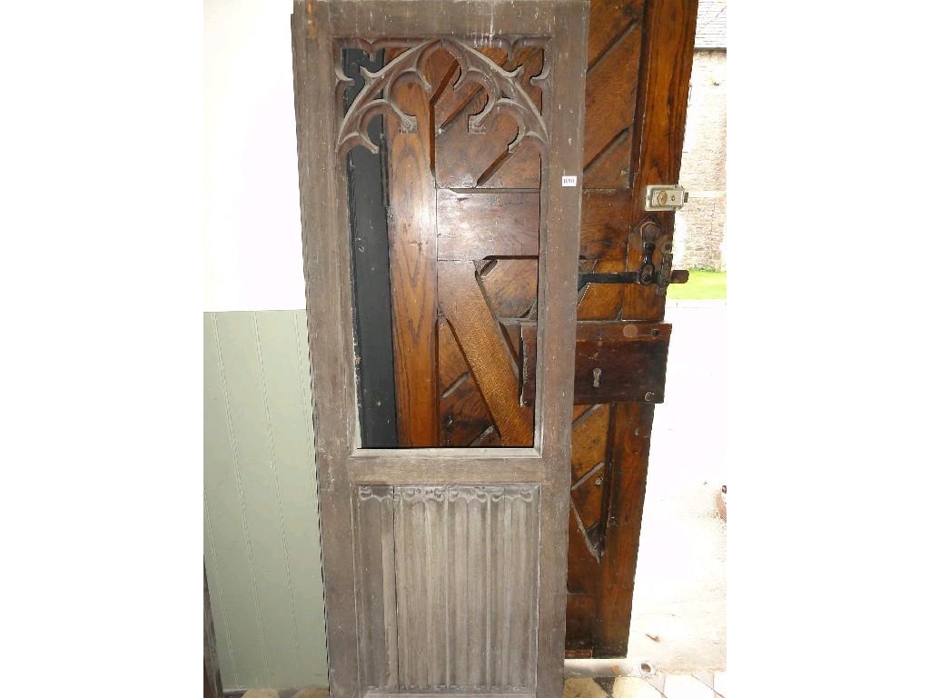 Appraisal: A pair of gothic revival oak internal doors with linen