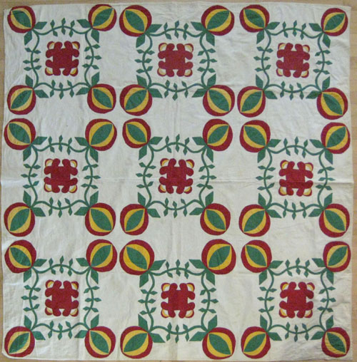 Appraisal: Appliqu summer quilt th c with red green and yellow