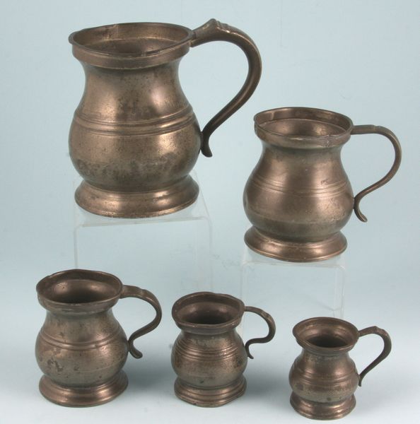 Appraisal: Five early English pewter measures h tallest two pieces hallmarked