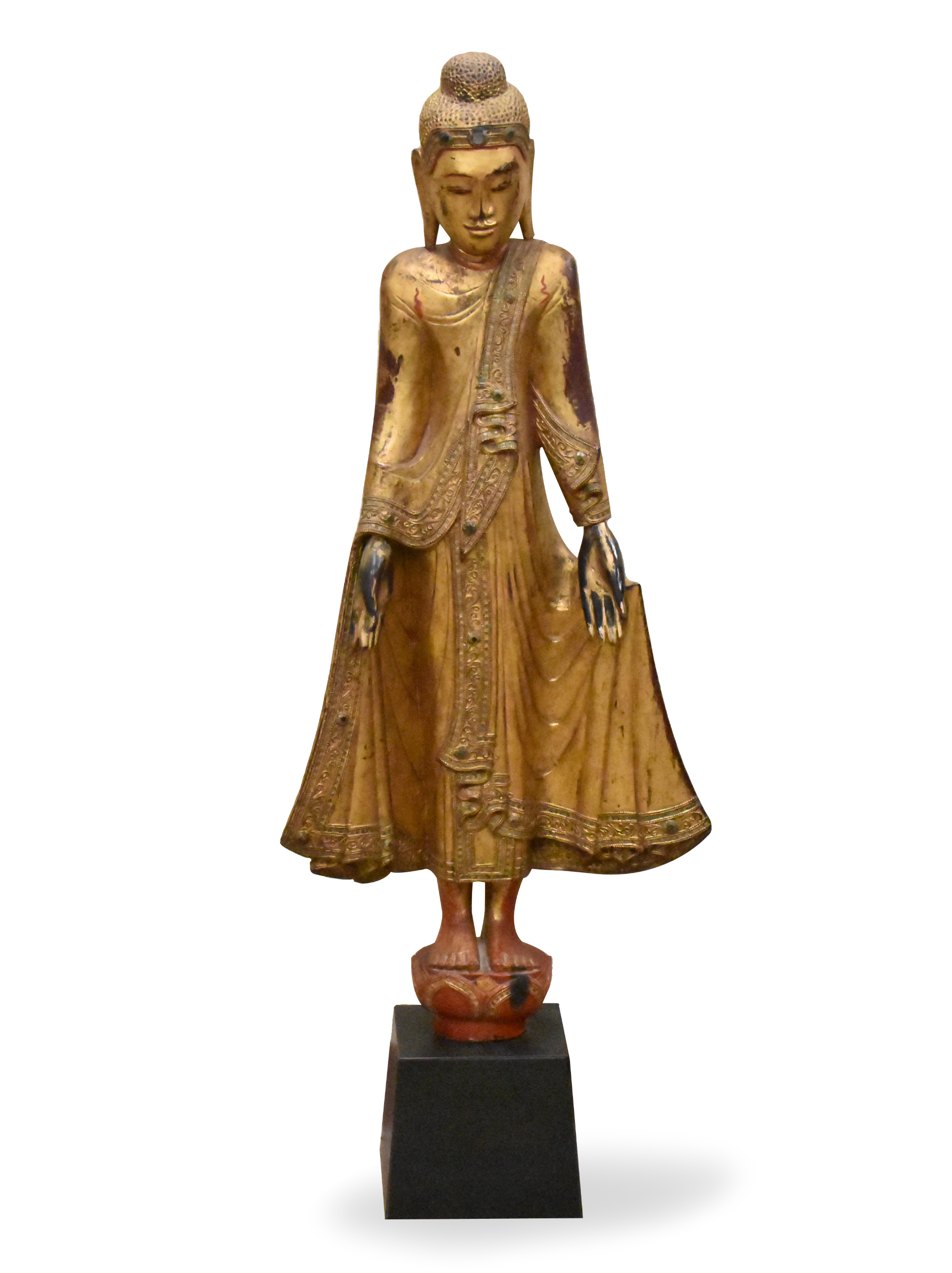 Appraisal: A large Burmese gilt lacquered wood buddha figure dating from