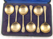 Appraisal: A set of six frosted silver gilt round bowled dessert