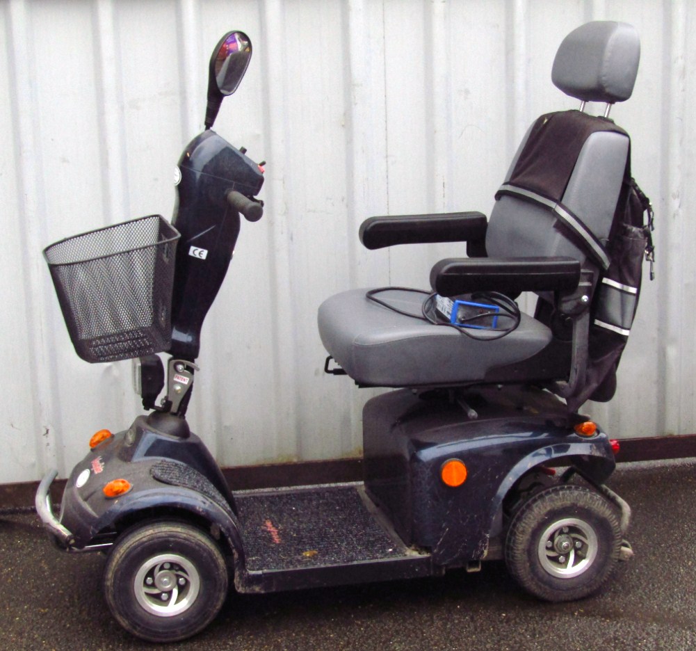 Appraisal: A Freerider four wheel mobility scooter with front basket grey