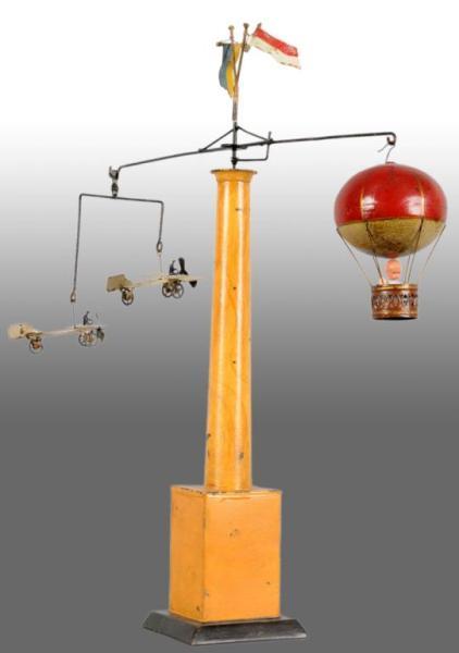 Appraisal: German Airplane Hot Air Balloon Tower Toy Description Hand-painted Wind-up