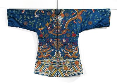 Appraisal: A Chinese blue silk jacket embroidered with dragons flaming pearls