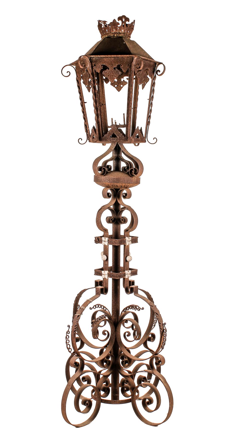 Appraisal: WROUGHT IRON LANTERN STANDARDCondition not electrified rust and heavy weathering