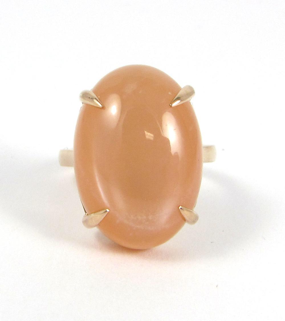 Appraisal: PEACH MOONSTONE CAT'S EYE AND ROSE GOLD RING The k