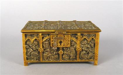 Appraisal: Gilt metal Gothic style casket The arched panel sides cast