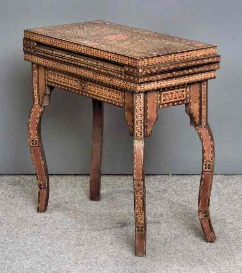 Appraisal: A th Century near Eastern stained wood and parquetry banded