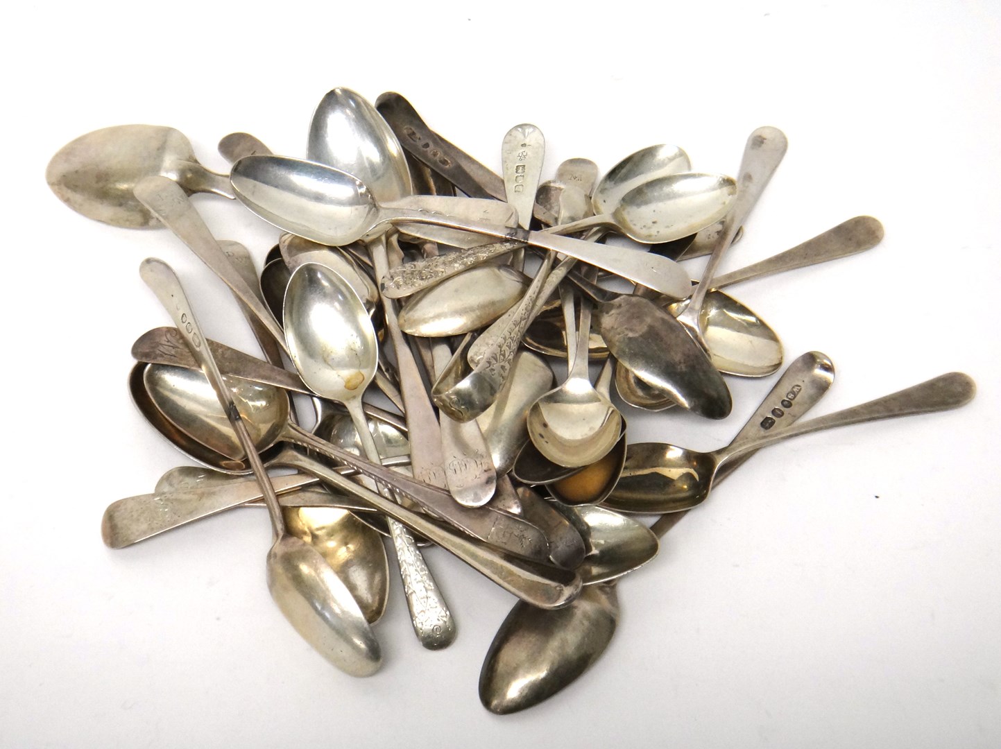 Appraisal: Four silver coffee spoons and a matching pair of sugar