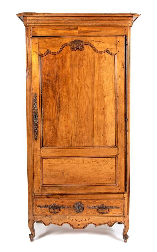 Appraisal: A French Provincial Carved Fruitwood Armoire A French Provincial Carved