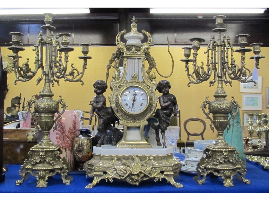 Appraisal: Gilt metal three piece garniture the clock of lyre form