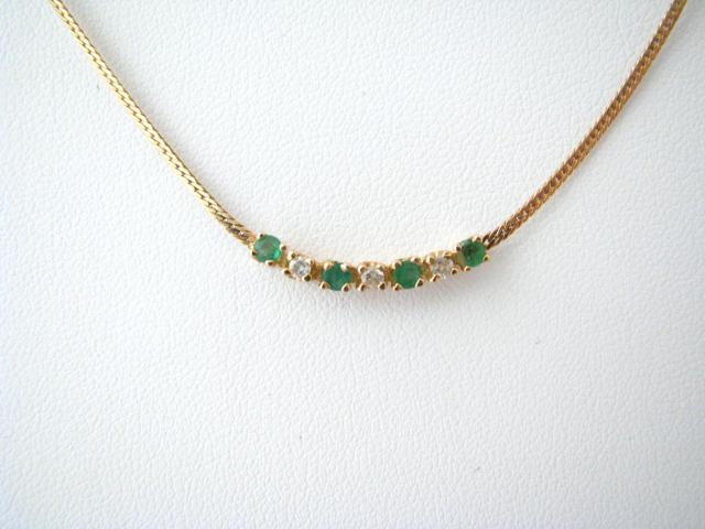 Appraisal: K yellow gold necklace with emeralds and diamonds