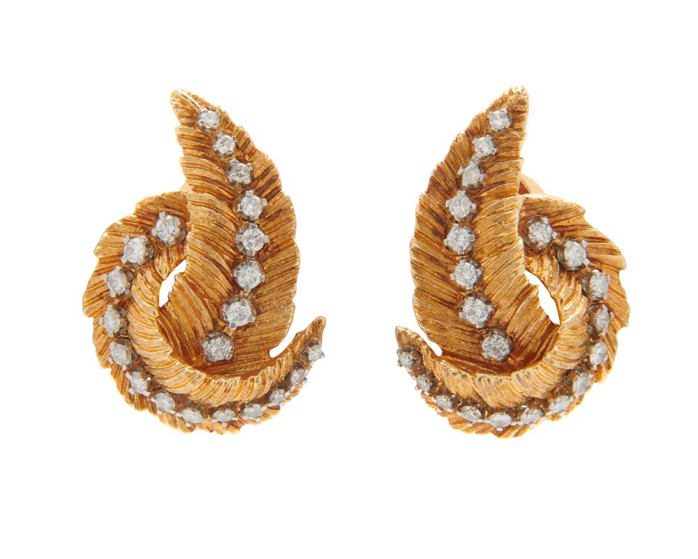 Appraisal: K Gold and Diamond Earclips the double leaf-form earclips each