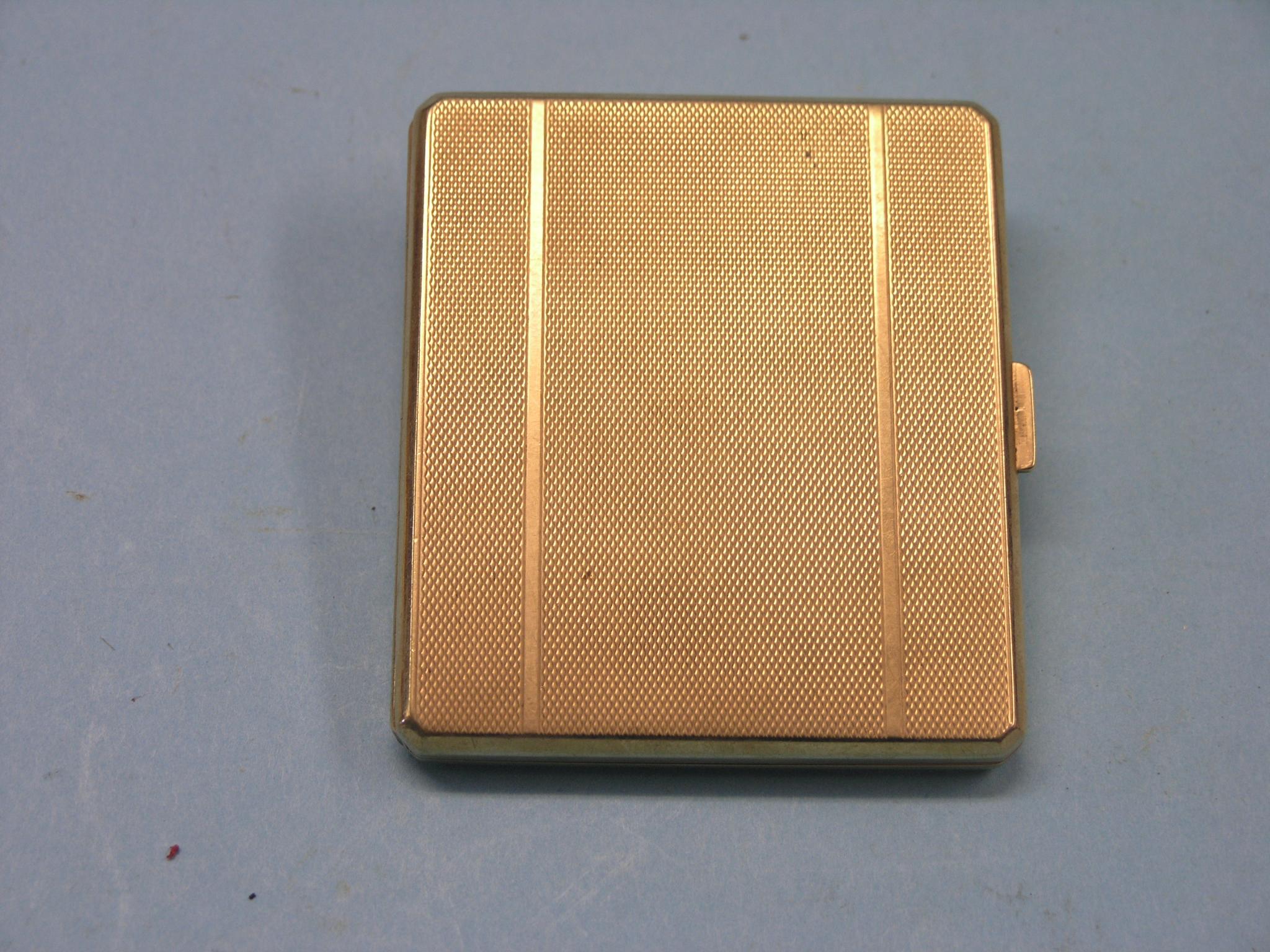 Appraisal: An engine-turned ct gold cigarette case Birmingham grams gross -