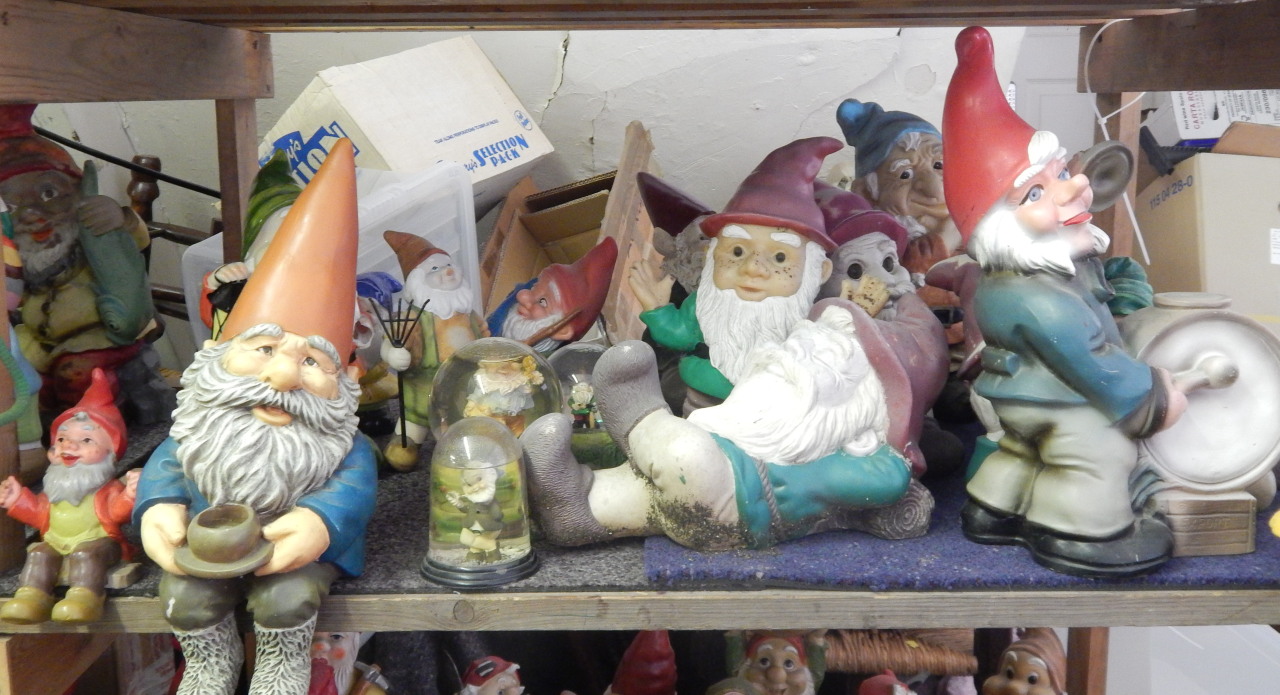 Appraisal: Various garden gnomes in unusual poses snow globes etc AF