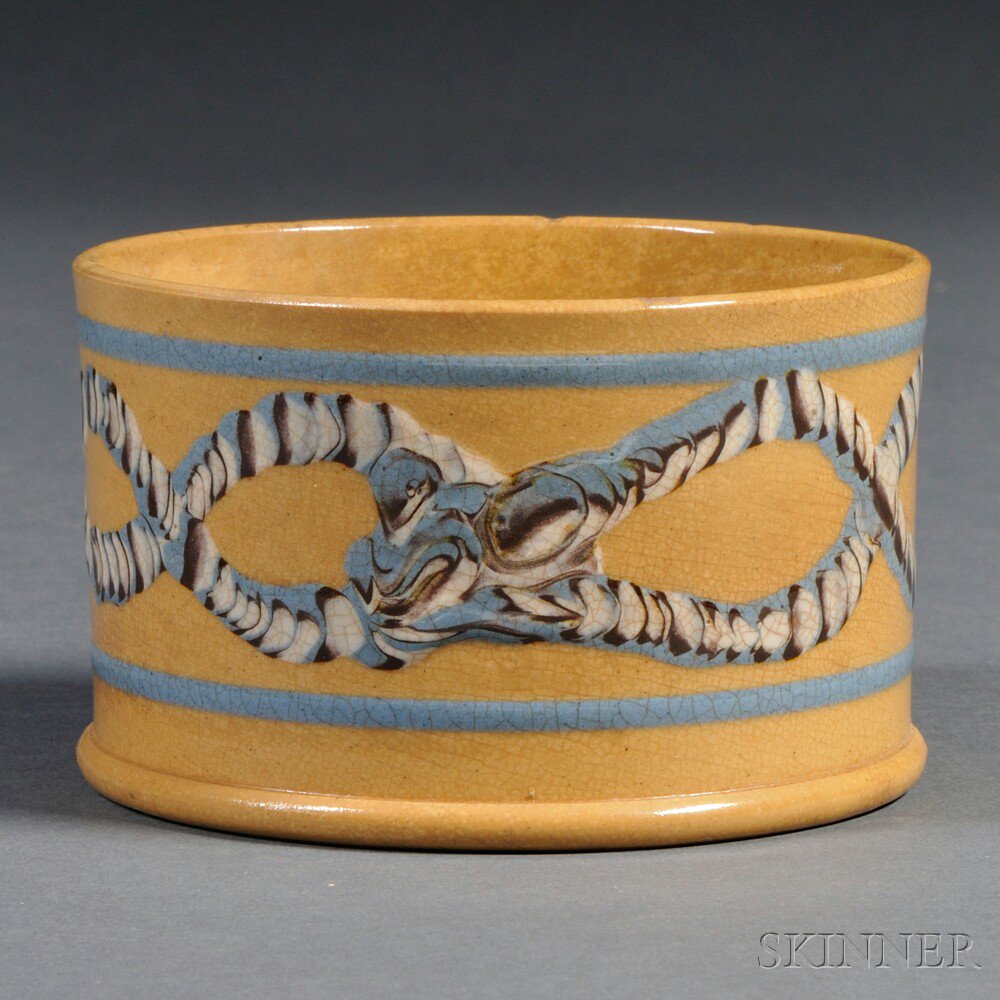 Appraisal: Yellowware Coaster with Mocha Earthworm Decoration North America or England